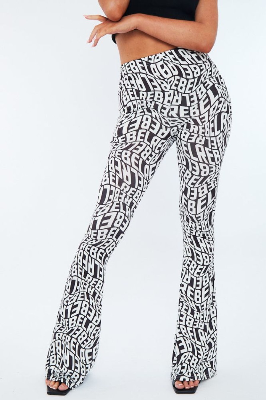 Clothing Rebellious Fashion | Black White Rebel Print Flare Trousers - Indy